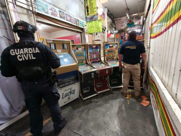 Guardia Civil apoya en cateos donde aseguran 64 máquinas tragamonedas en Morelia