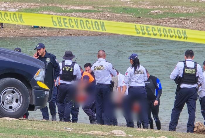 Hallan los cuerpos de los 2 jóvenes estudiantes ahogados en la presa de Cointzio